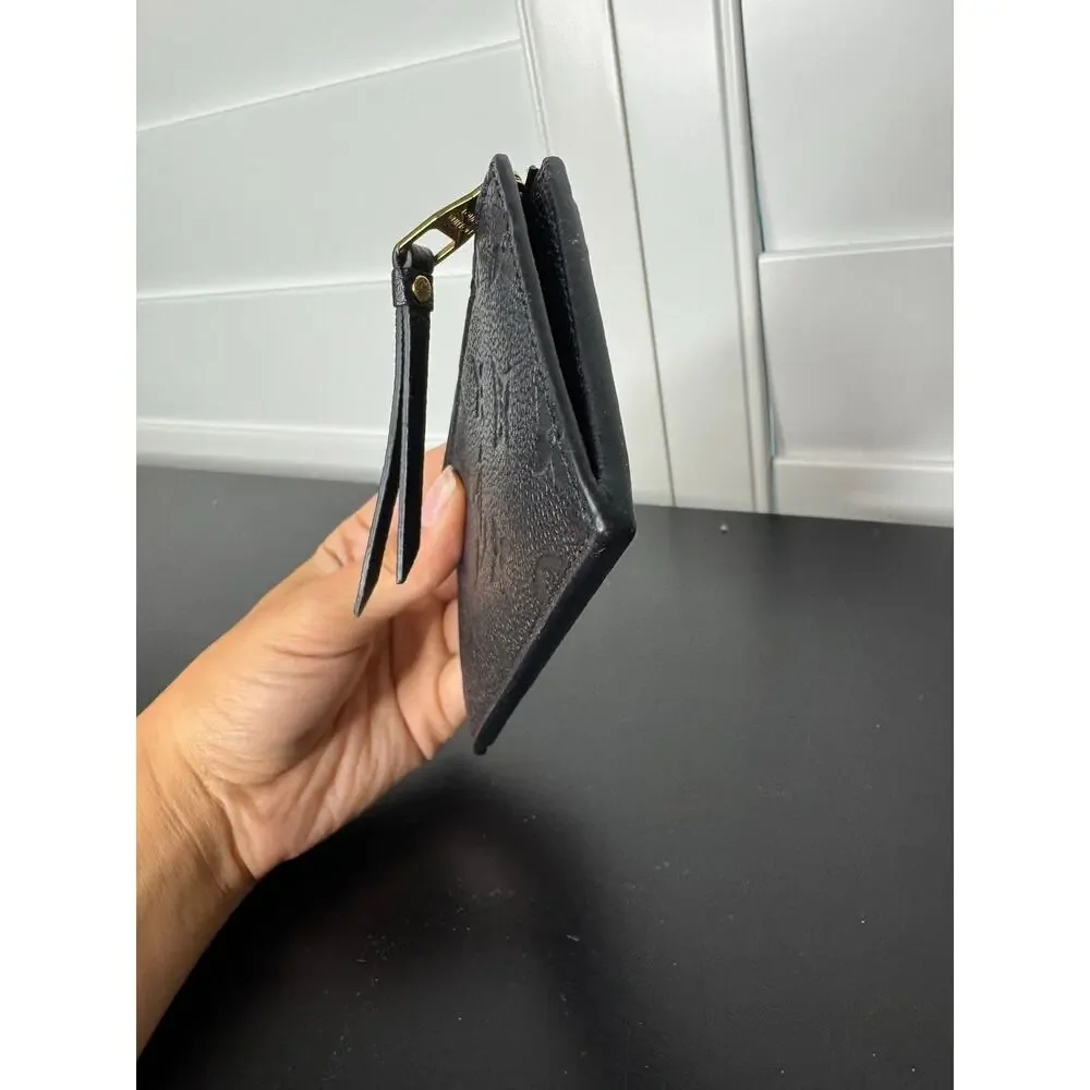 Louis Vuitton | Mélanie Pochette – Monogram Empreinte Leather